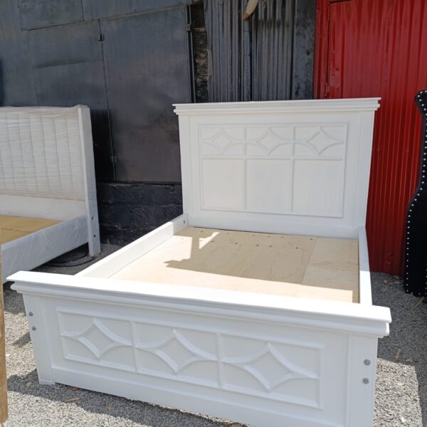 White wooden 5 by 6 bed