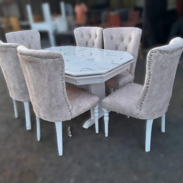 Beige 6 seater dining table